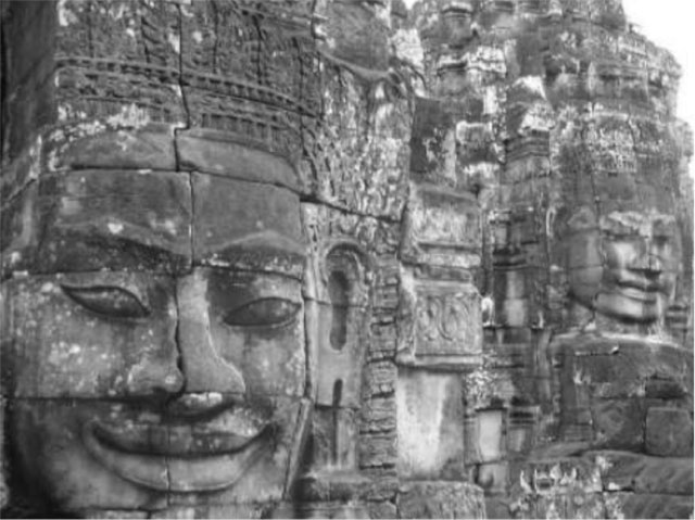 Stone faces in Cambodia. Photo by Tammy Ho.