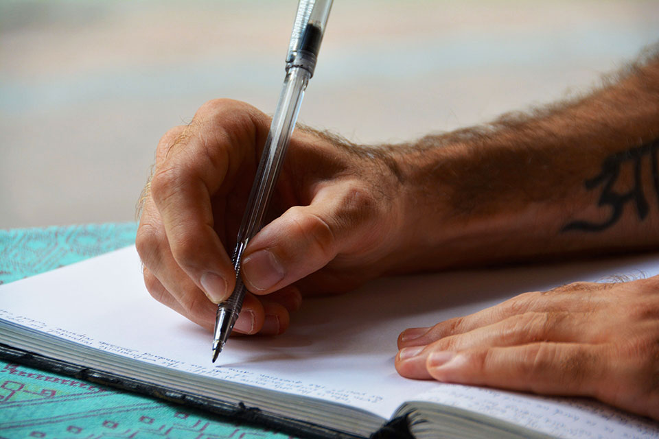 Man writing a note