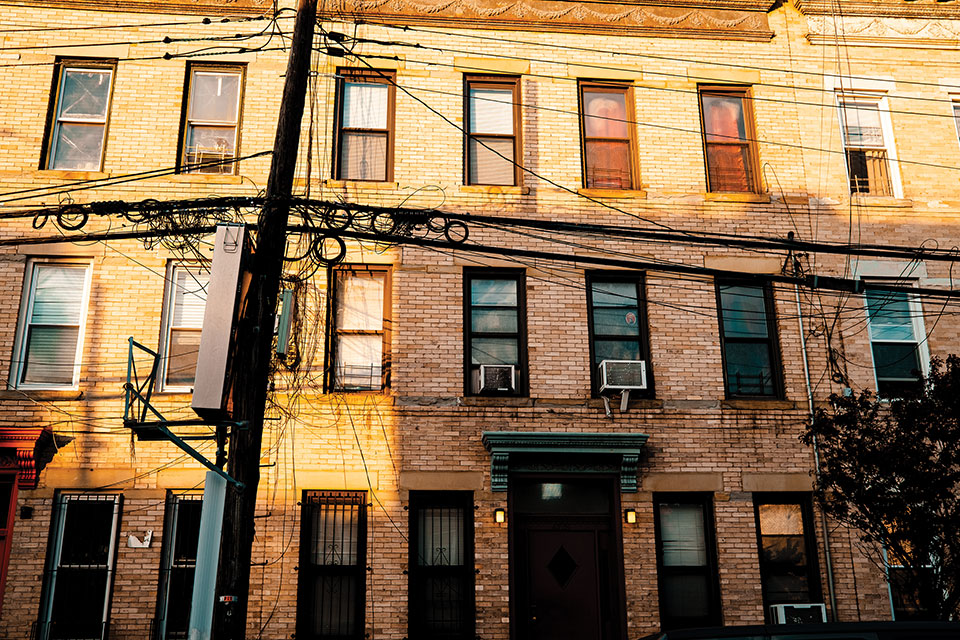 A photograph of an urban apartment building. 