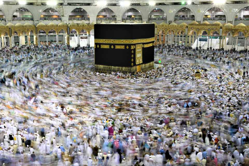 A photograph of a throng of people gathered for the Hajj