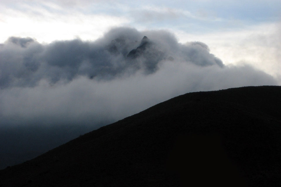 A cloud-capped mountain