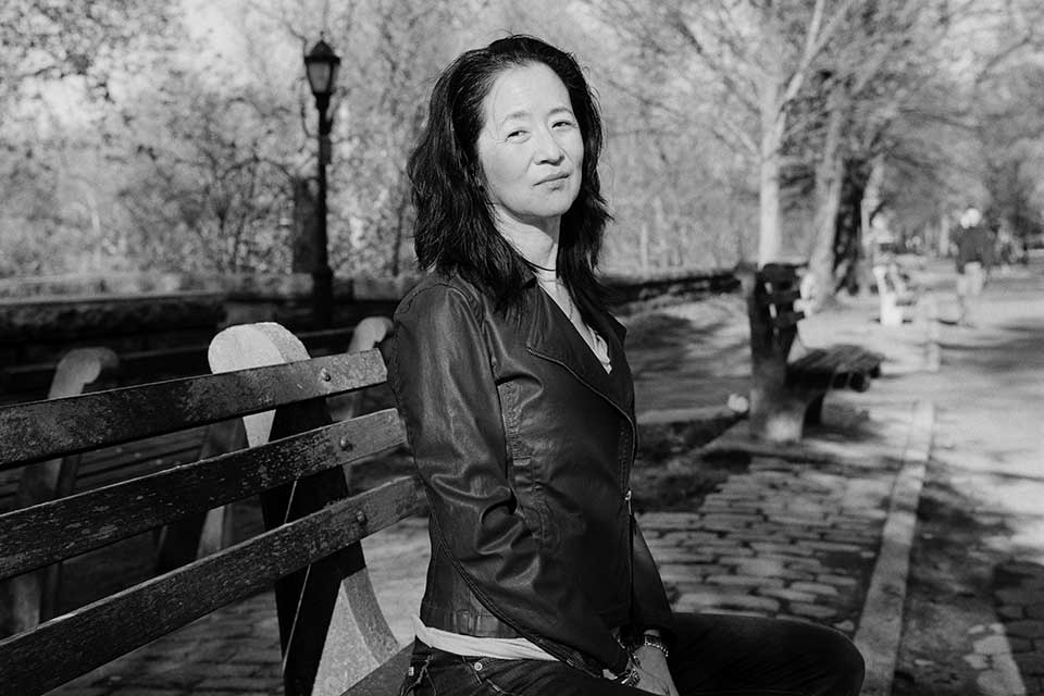 A black and white photograph of author Julie Otsuka