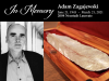 A photograph of Adam Zagajewski juxtaposed with an image of a pewter feather in a wooden box. The text above reads: In Memory, Adam Zagajewski, 2004 Neustadt Laureate