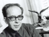 A black and white photograph of Ismail Kadare