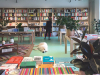 Bookcases and a dog inside Commonplace Books in Oklahoma City.