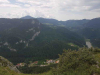 A photograph of a small village in a river valley