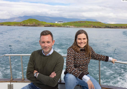 A photograph of Katrín Jakobsdóttir & Ragnar Jónasson on a boat at sea