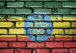 The flag of Ethiopia spray painted on a brick wall