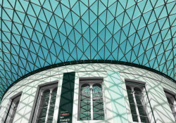 An interior shot looking up at the ceiling of the British Museum Reading Room